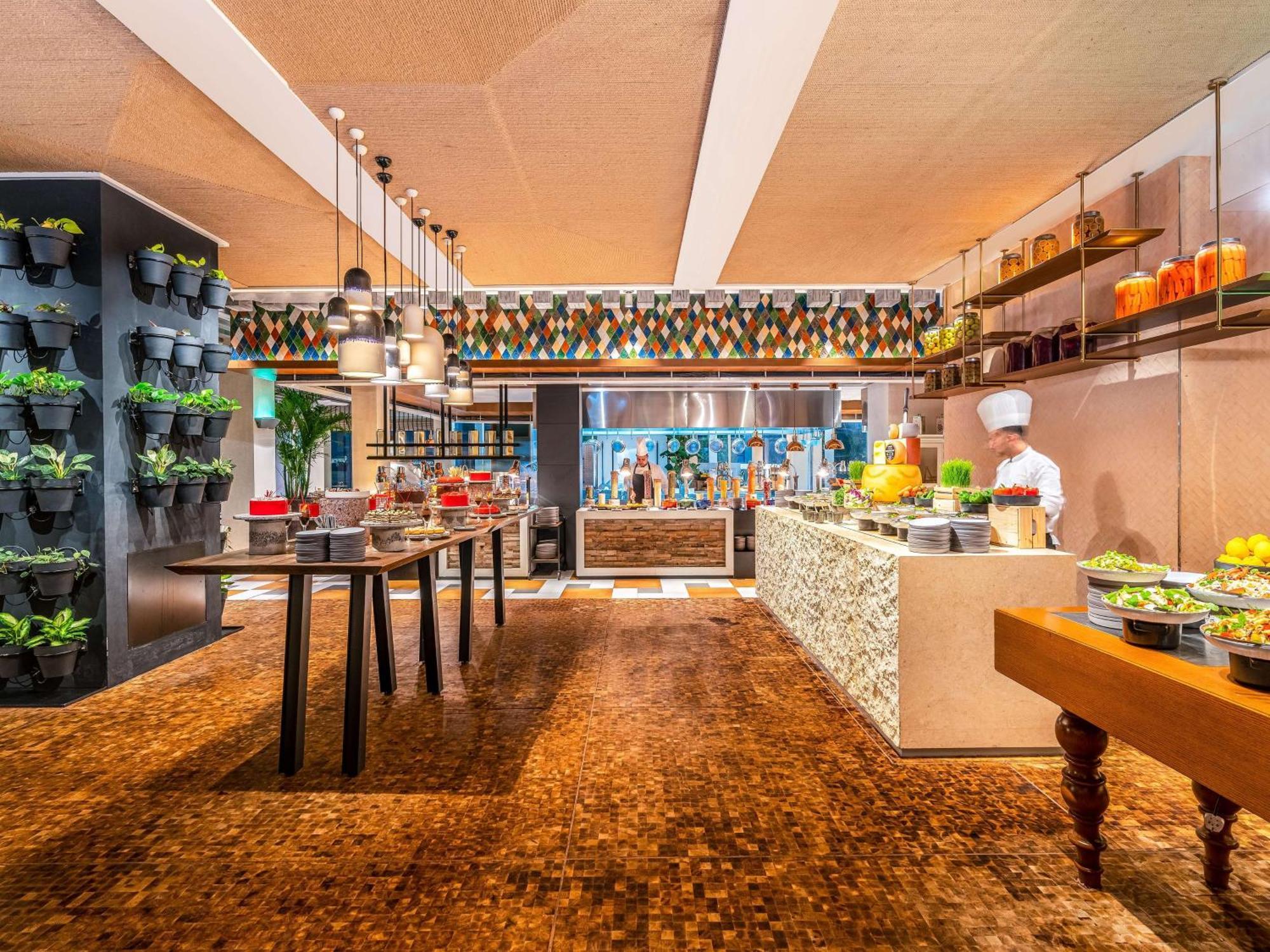 Rixos Gulf Hotel Ad Dawhah Esterno foto The Kitchen