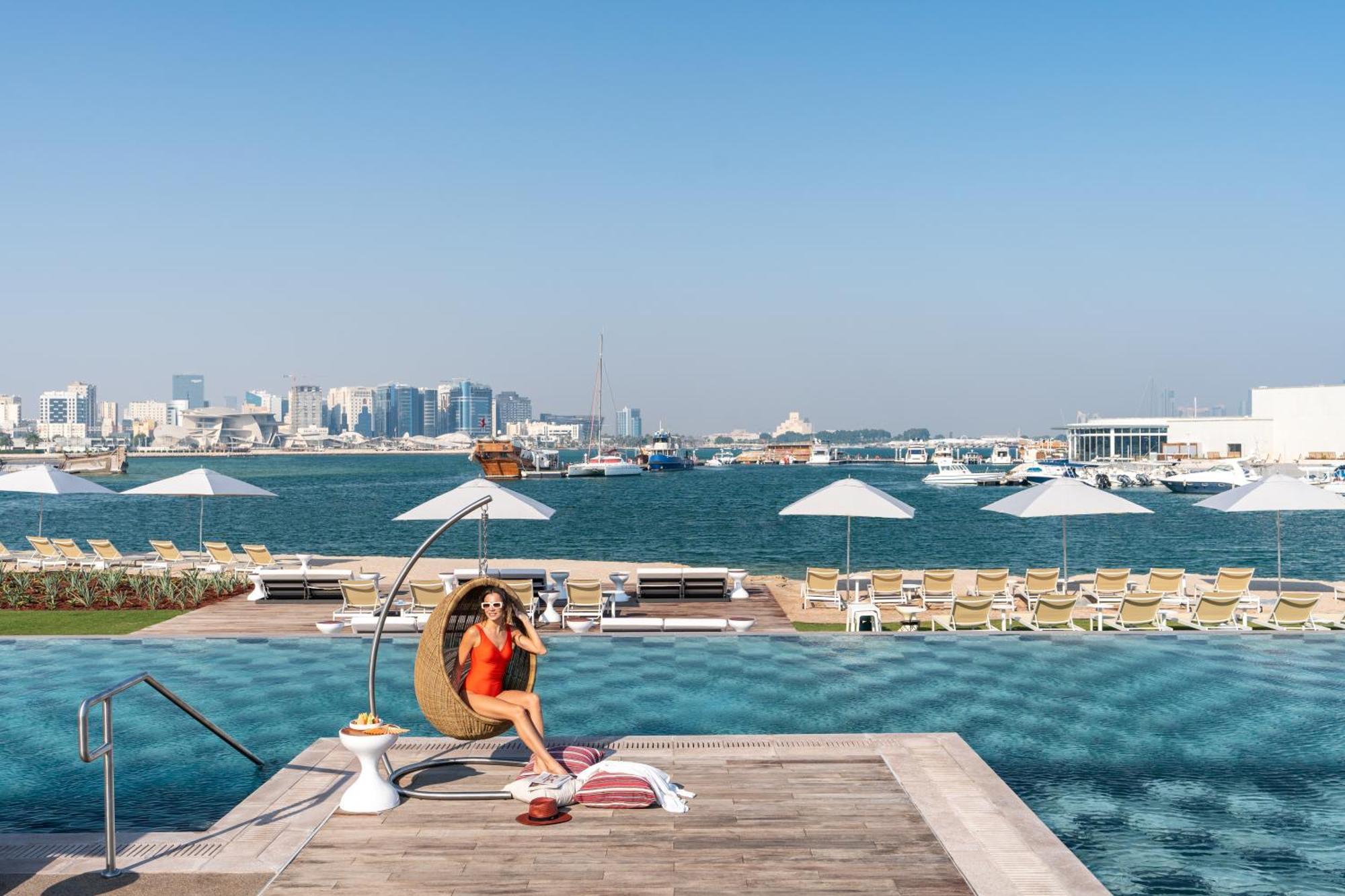Rixos Gulf Hotel Ad Dawhah Esterno foto View of the Dubai Marina skyline from the Westin